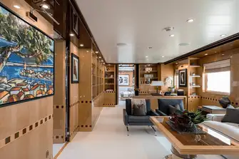 The large lounge and office at the entrance to the owner's suite