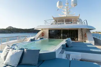 The large glass fronted pool on the bridge deck aft overlooked by a dedicated gym inside