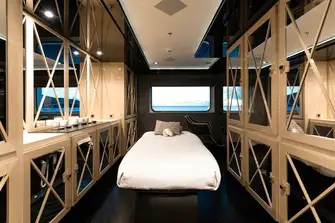 Her main deck spa area has a massage table as well as a hair and beauty salon