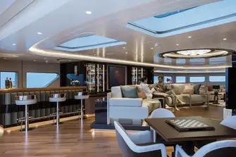 The sun deck clubroom has a working fireplace below skylights