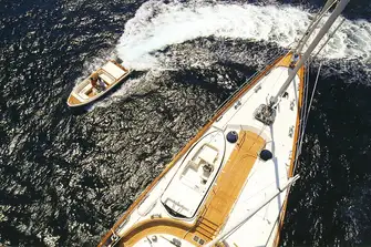 Her two 6m custom tenders are stowed on the foredeck