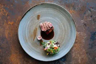 Le Blue Bay - Plated to look as though it is served on a seabed