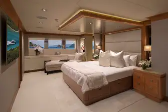 The full beam owner's suite forward on the main deck