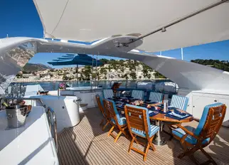 Open air dining with BBQ and optional shade from removable awnings